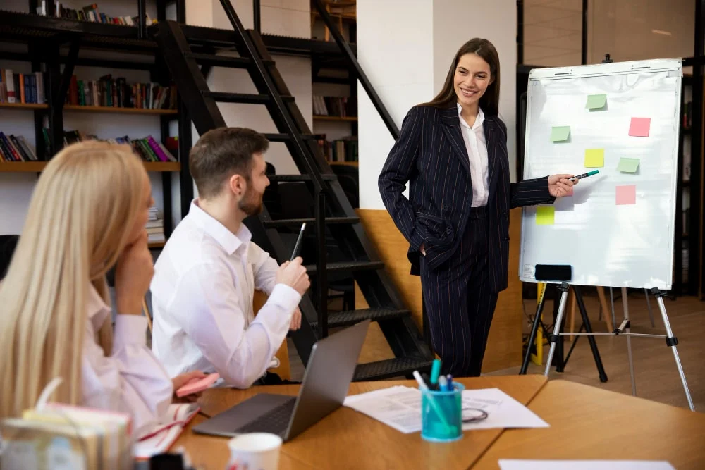 Professionals discussing a plan in a collaborative working session